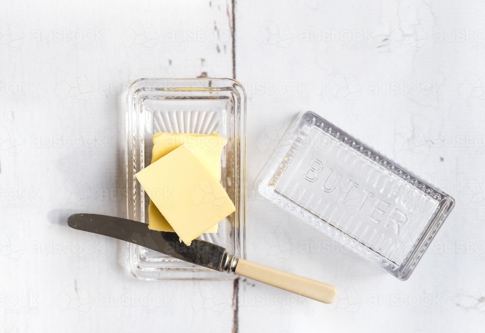 Fresh butter in a butter dish. - Australian Stock Image