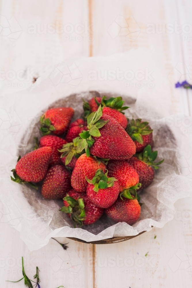 fresh strawberries in a bowl - Australian Stock Image