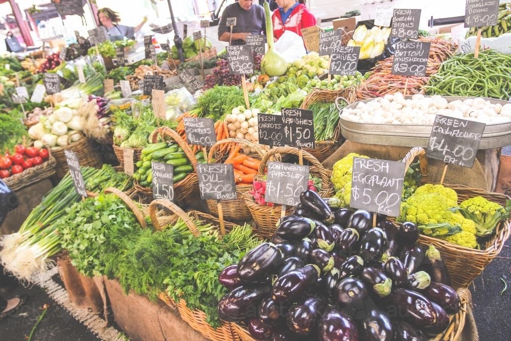 Fresh vegetables on display at an outdoor market - Australian Stock Image