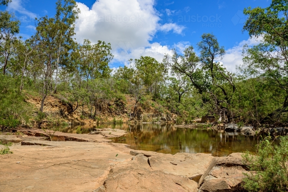Fresh water creek and swimming hole in the summer - Australian Stock Image