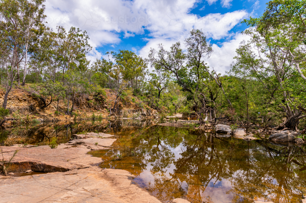 Fresh water creek and swimming hole in the summer - Australian Stock Image