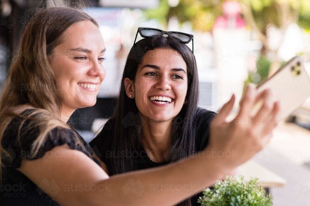 friends taking a selfie - Australian Stock Image