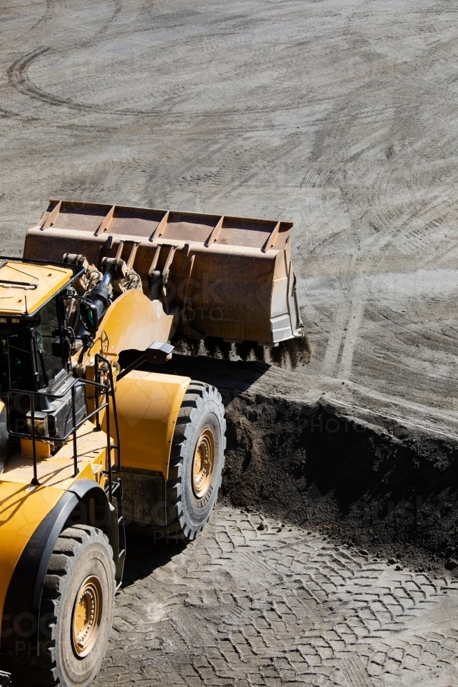 Front end loader working at a quarry - Australian Stock Image