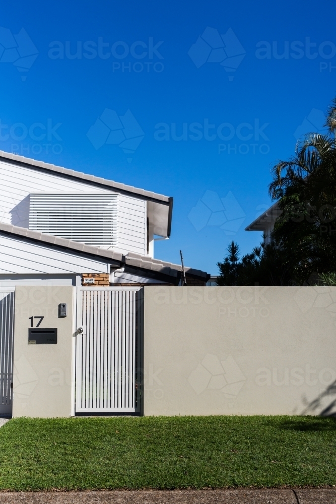 Front gate, mailbox and lawn of a house in Noosaville, queensland - Australian Stock Image