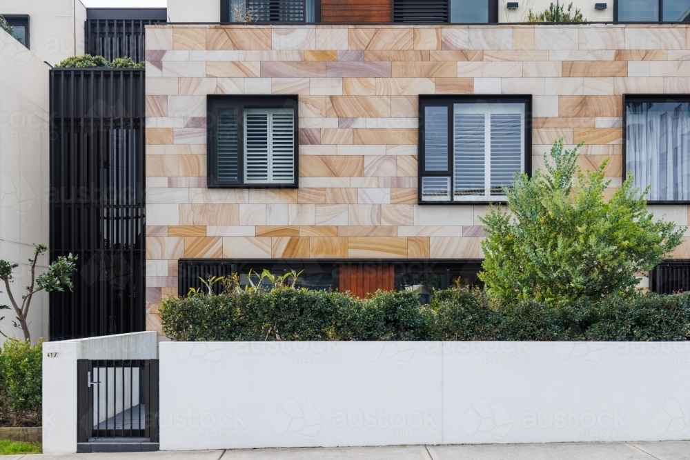 Front of modern sandstone residence - Australian Stock Image