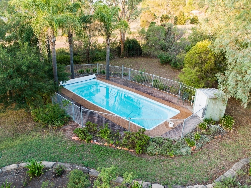 Front yard with in ground swimming pool - Australian Stock Image