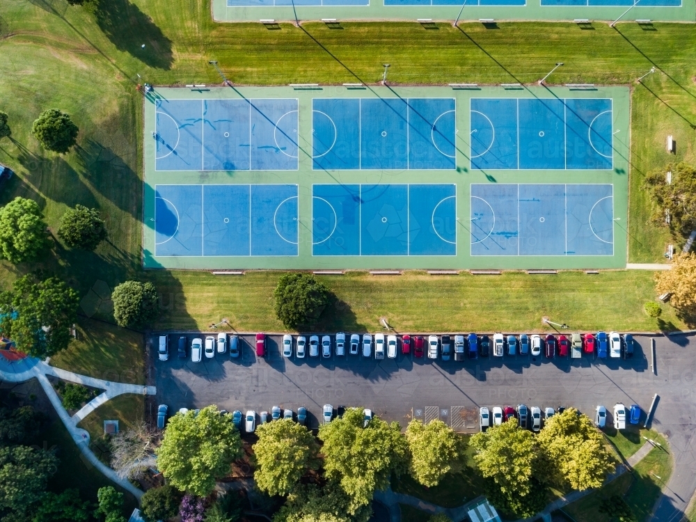 Full carpark at rose point park beside netball courts for morning parkrun exercise - Australian Stock Image