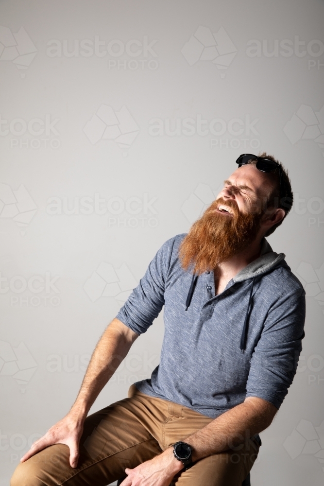 Funky man posing for photographs - Australian Stock Image