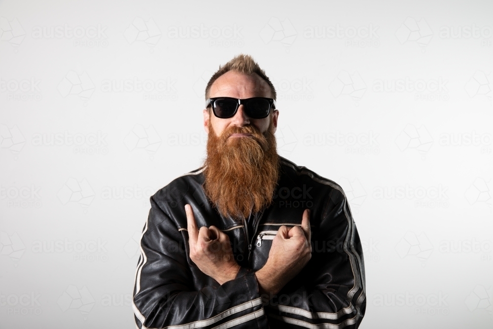 Funky man posing for photographs - Australian Stock Image