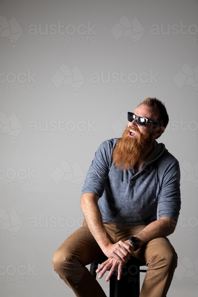 Funky man posing for photographs - Australian Stock Image