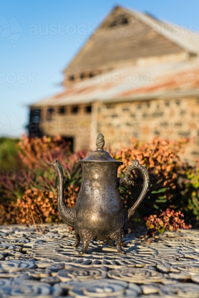 garden quirky decor, old silver teapot - Australian Stock Image
