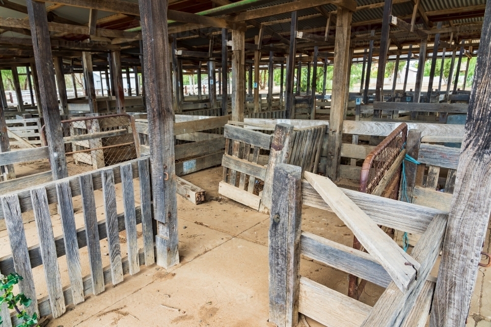 Gates and pens in an old undercover sale yards - Australian Stock Image