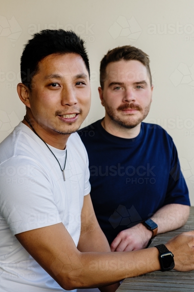 gay couple having a coffee - Australian Stock Image