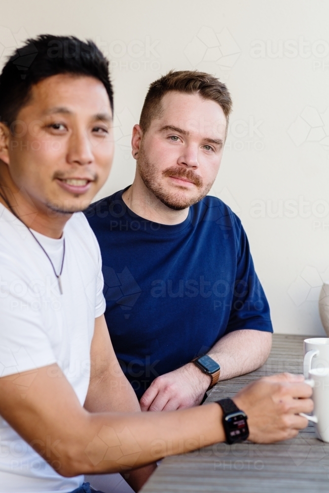 gay men drinking coffee - Australian Stock Image