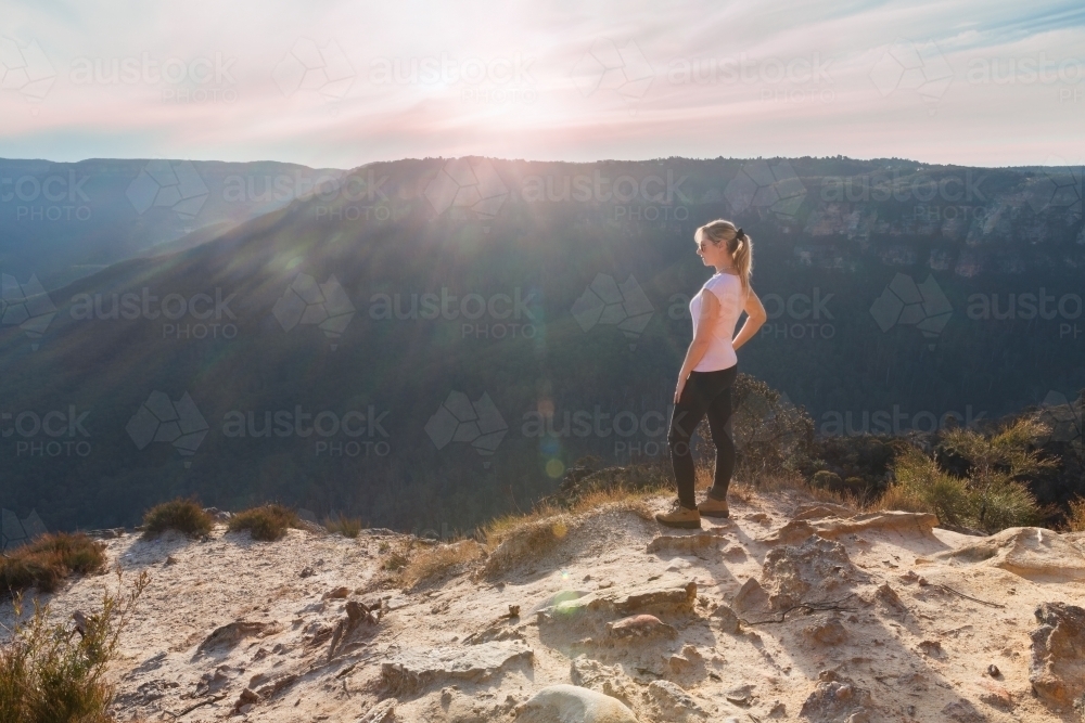 Gazing at the viies for miles high up on the mountain cliff tops - Australian Stock Image