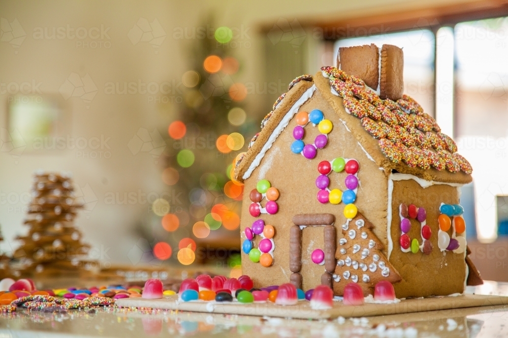 Gingerbread house decorated with lollies for christmas - Australian Stock Image