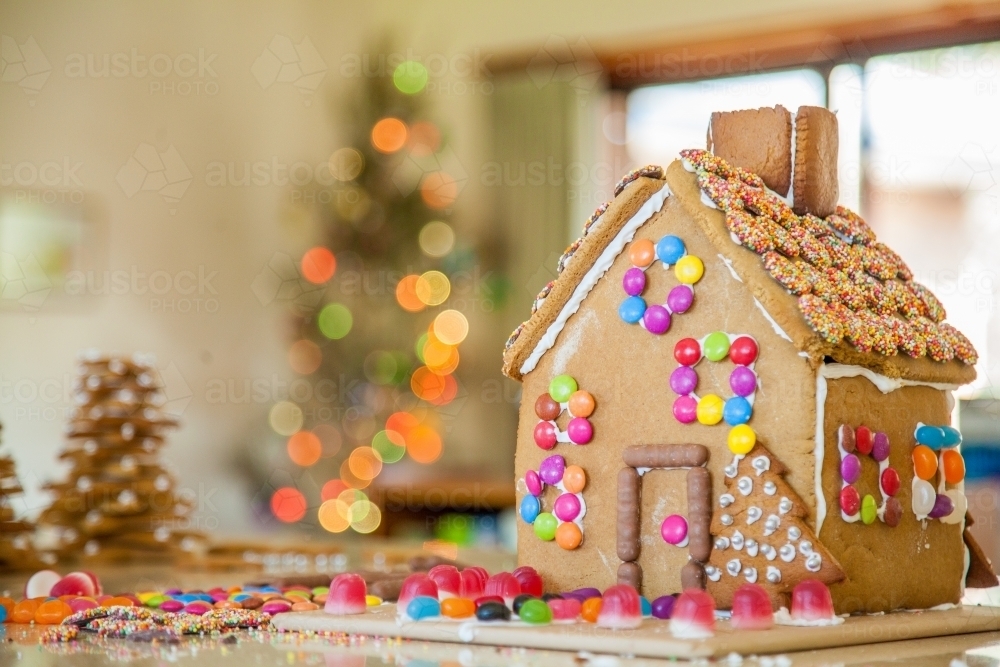 Gingerbread house decorated with lollies for christmas - Australian Stock Image