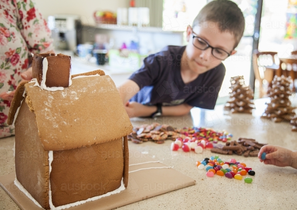 Gingerbread house ready to be decorated with lollies for christmas - Australian Stock Image