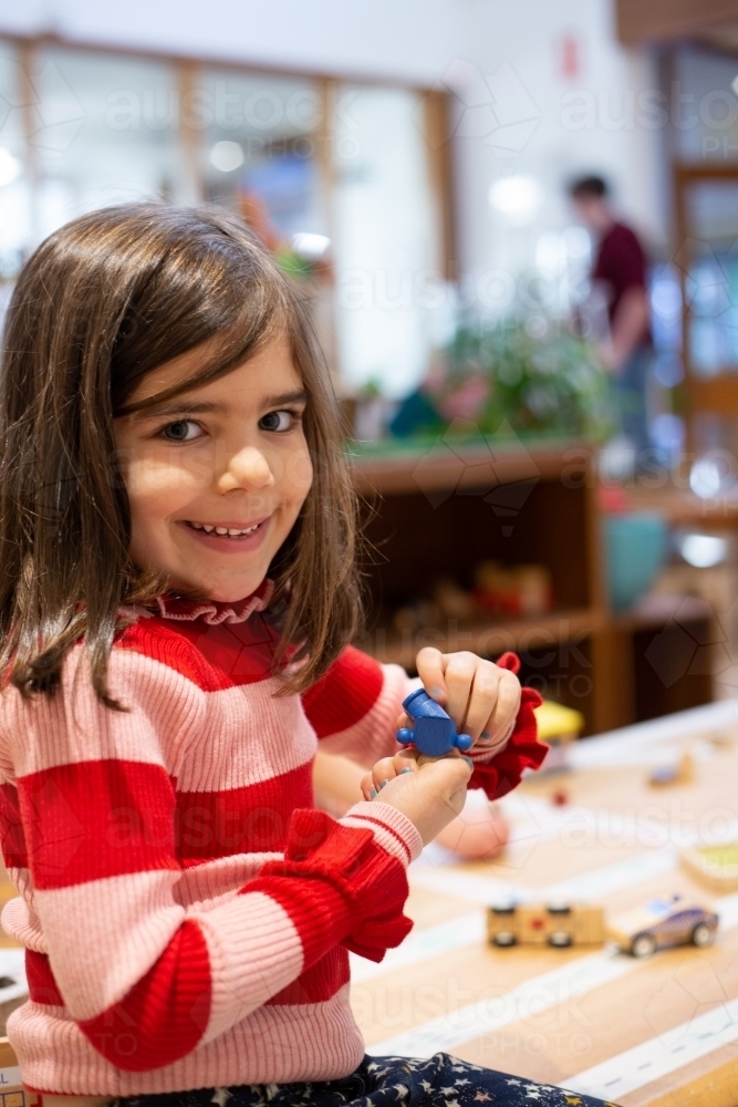 Girl child learning at pre-school - Australian Stock Image