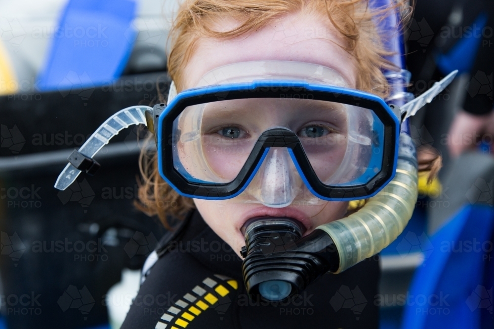 girl wearing mask and snorkel - Australian Stock Image