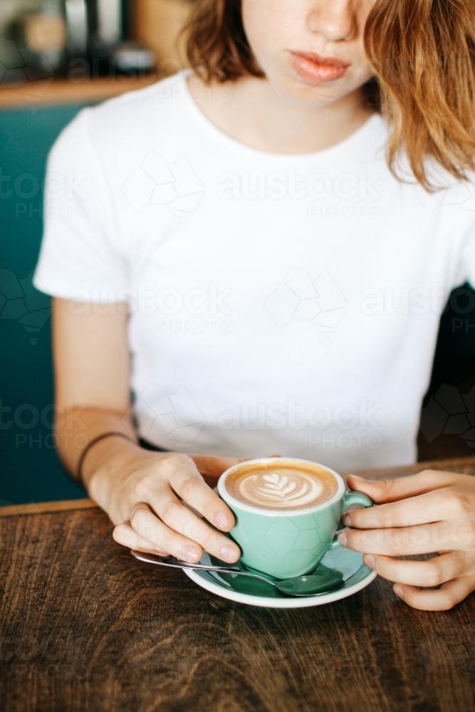 Girl with coffee - Australian Stock Image