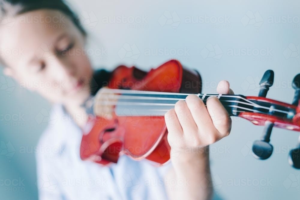 girl with violin - Australian Stock Image