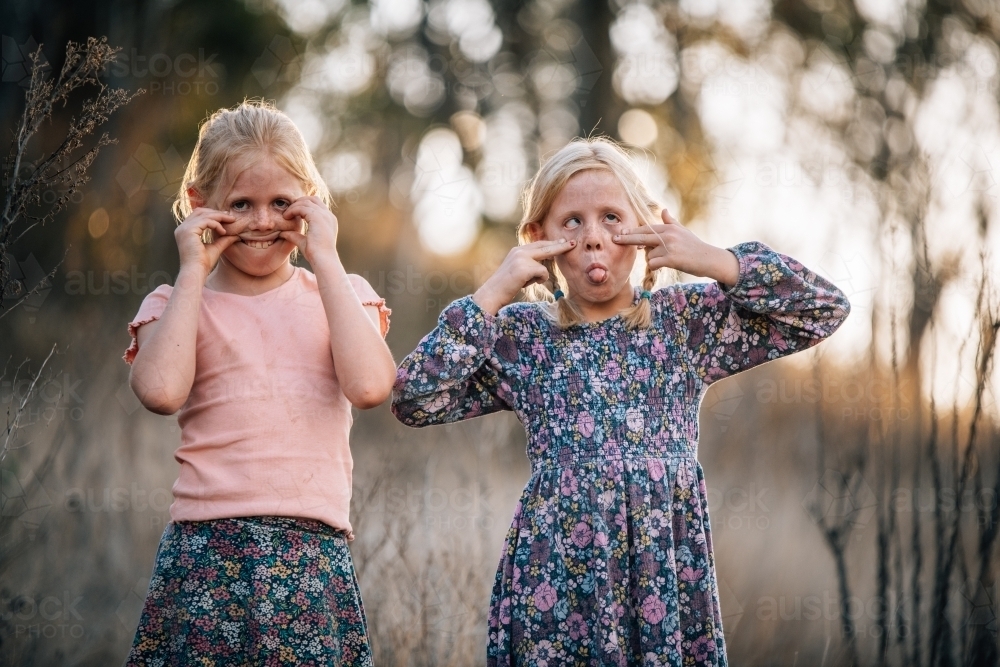 Girls making silly faces to the camera - Australian Stock Image