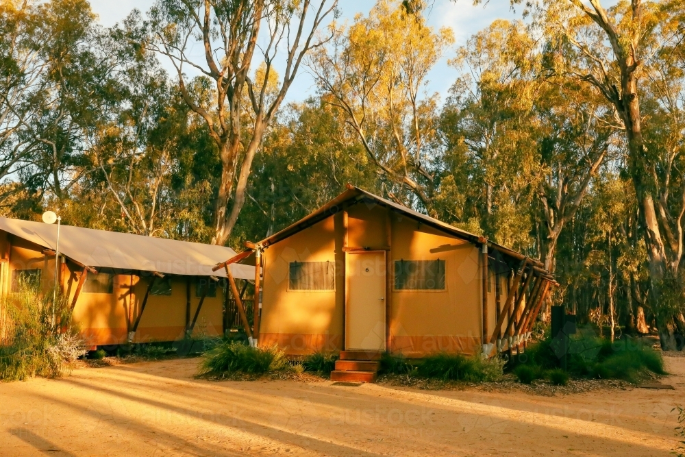 Glamping tents on the Gunbower Creek at Koondrook, Victoria - Australian Stock Image