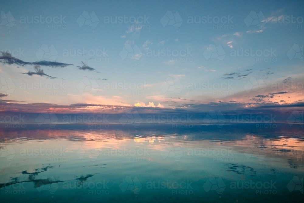 Glassy sunrise on the ocean - Australian Stock Image