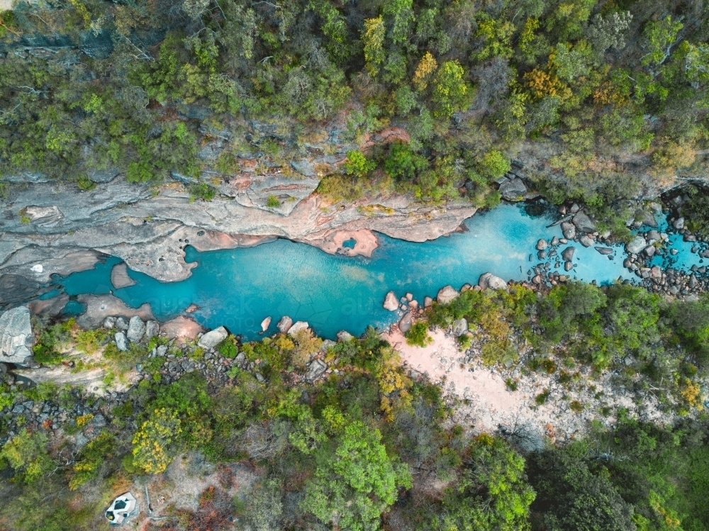 Glenbrook creek meandering gently through the mountain gorge before it enters the Nepean River - Australian Stock Image