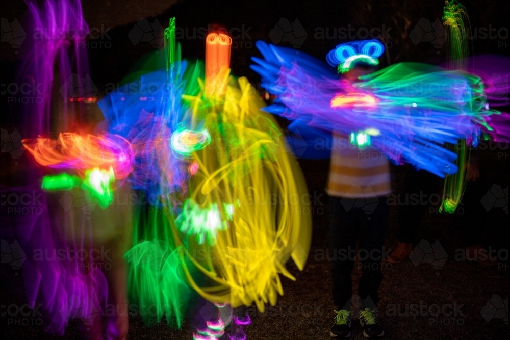 Image Of Glow Stick Patterns Long Exposure At Night Austockphoto image-of-glow-stick-patterns-long-exposure-at-night-austockphoto