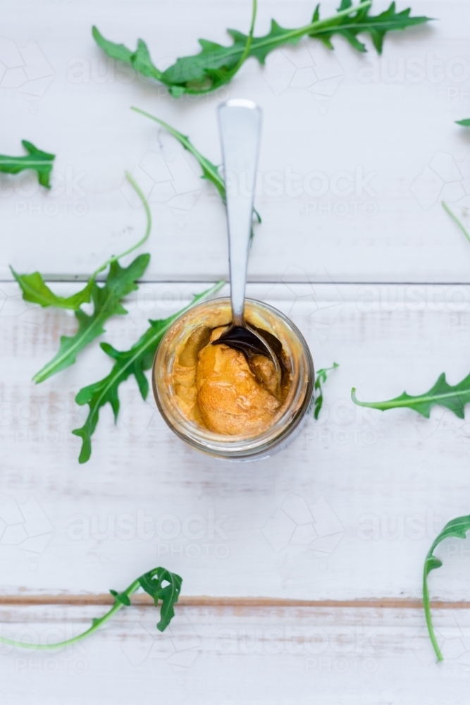 Image of gold mustard in a jar Austockphoto