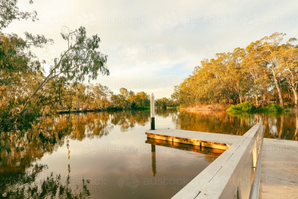 golden afternoon at the Koondrook jetty on the Gunbower Creek in Victoria, Australia - Australian Stock Image