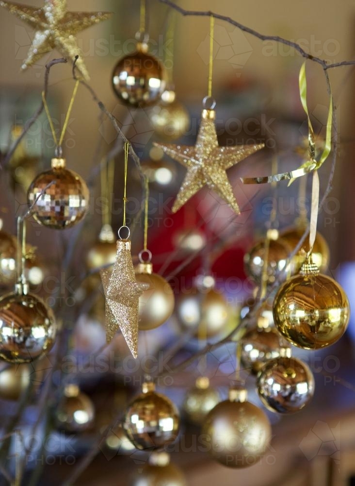 Golden Christmas baubles and stars - Australian Stock Image