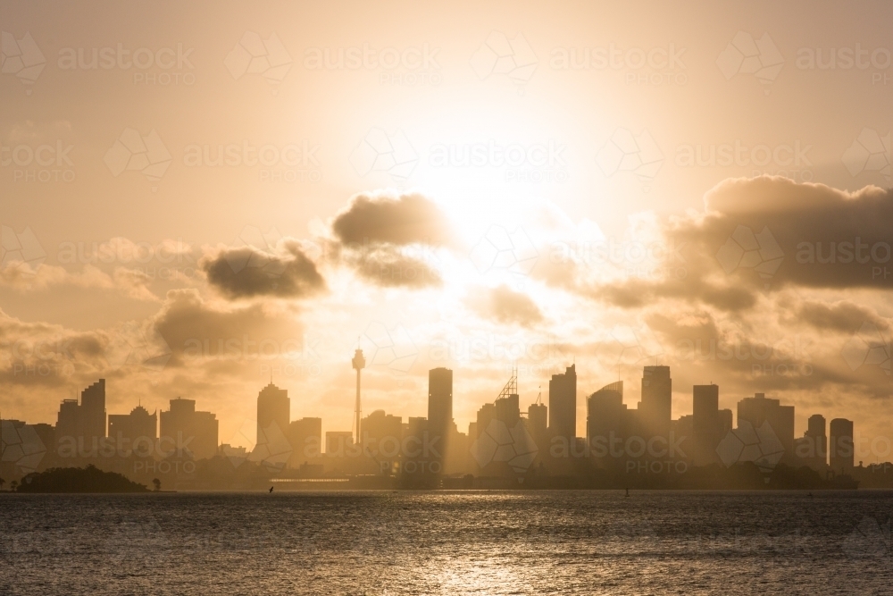 Golden sunset over Sydney CBD, Sydney Harbour - Australian Stock Image