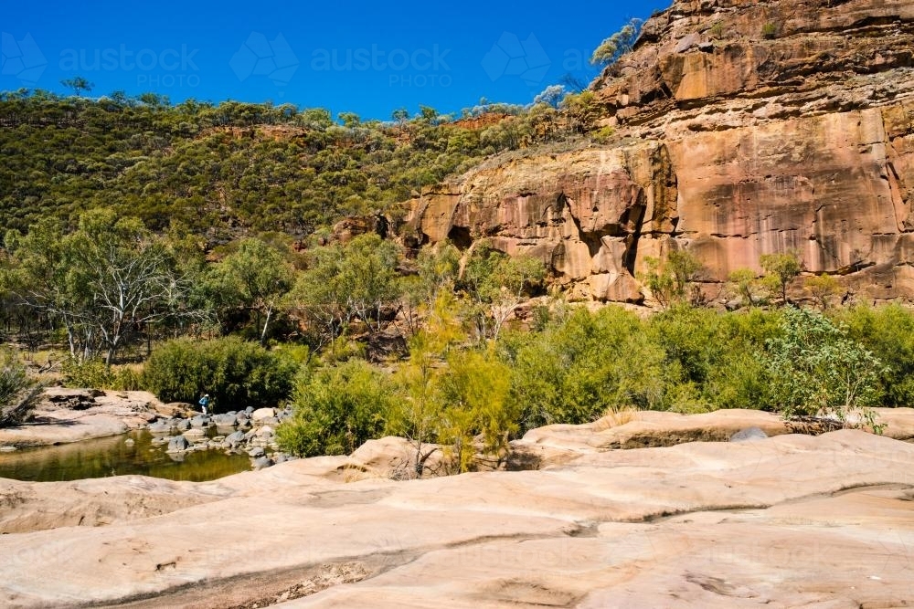 Gorge landscape with sandstone rock formation and blue sky - Australian Stock Image