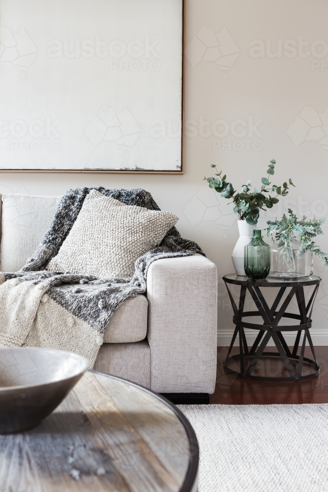 Gorgeous neutral interior of light textures and a blank wall art - Australian Stock Image