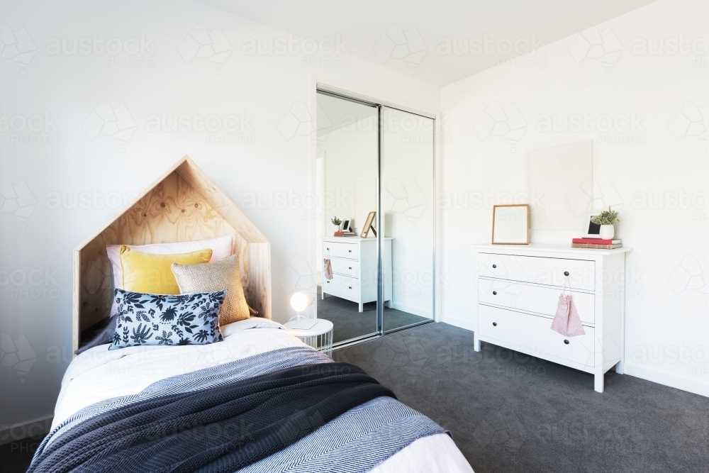 Gorgeous young girl's bedroom beautifully styled - Australian Stock Image