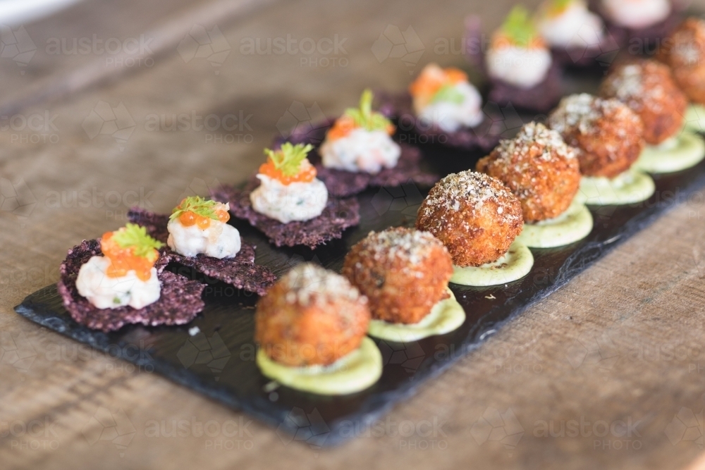 Gourmet Canapés on Rustic Setting - Australian Stock Image