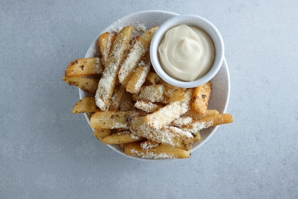 Gourmet hot chips with mayonnaise dip - Australian Stock Image