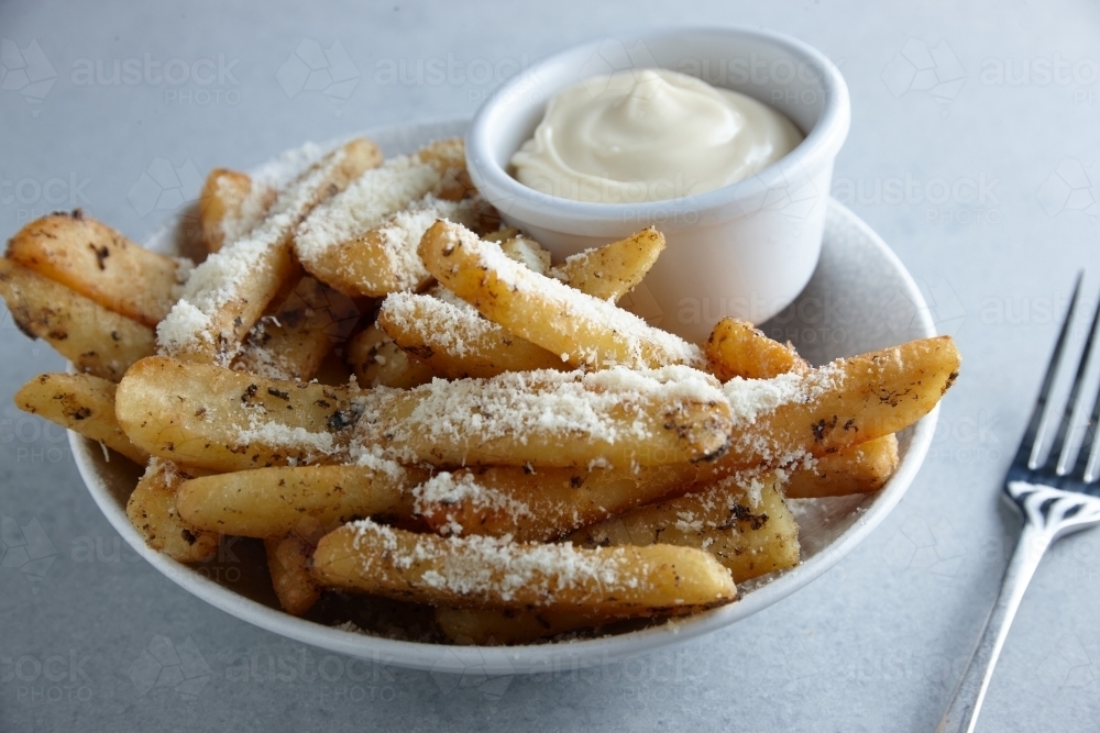 Image of Gourmet hot chips with mayonnaise dip Austockphoto