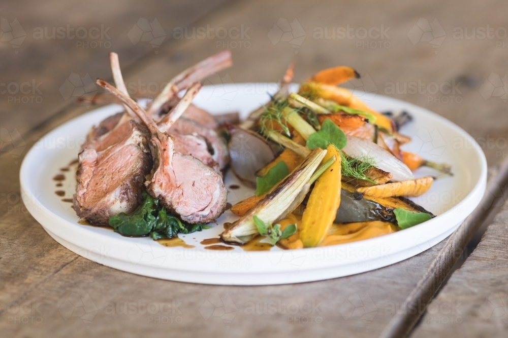 Gourmet Organic Meal on Rustic Table - Australian Stock Image