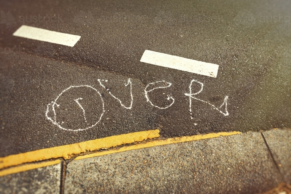 Graffiti on asphalt road - Australian Stock Image