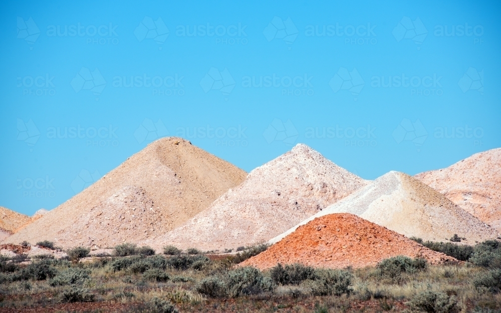 Grain mounds from opal mining in outback Australia. - Australian Stock Image