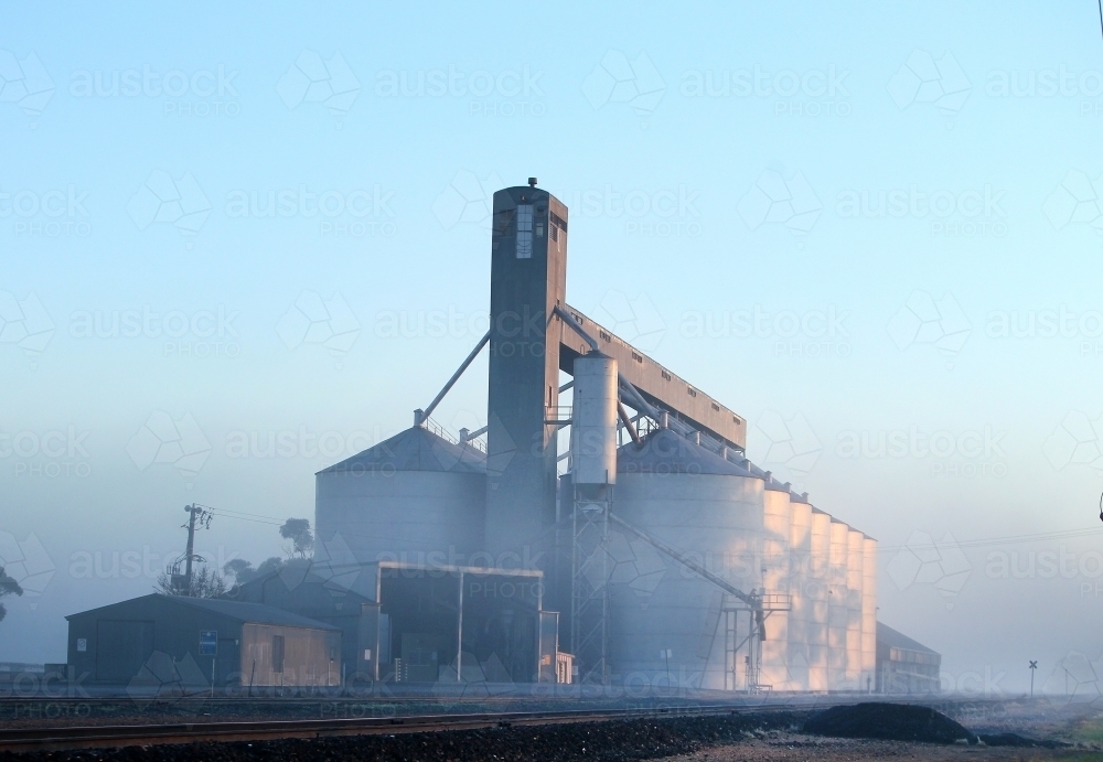 Grain silos at first light in winter - Australian Stock Image