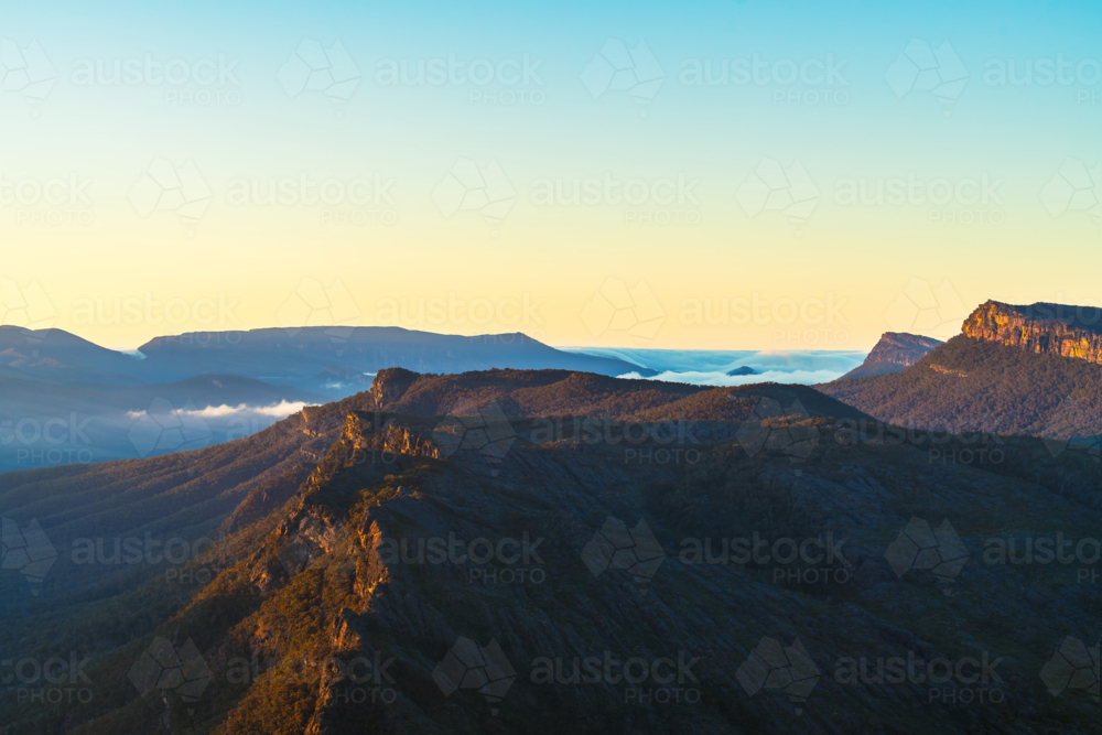Grampians mountains peaks during sunrise viewed from Boroka Lookout, Grampians, Victoria - Australian Stock Image