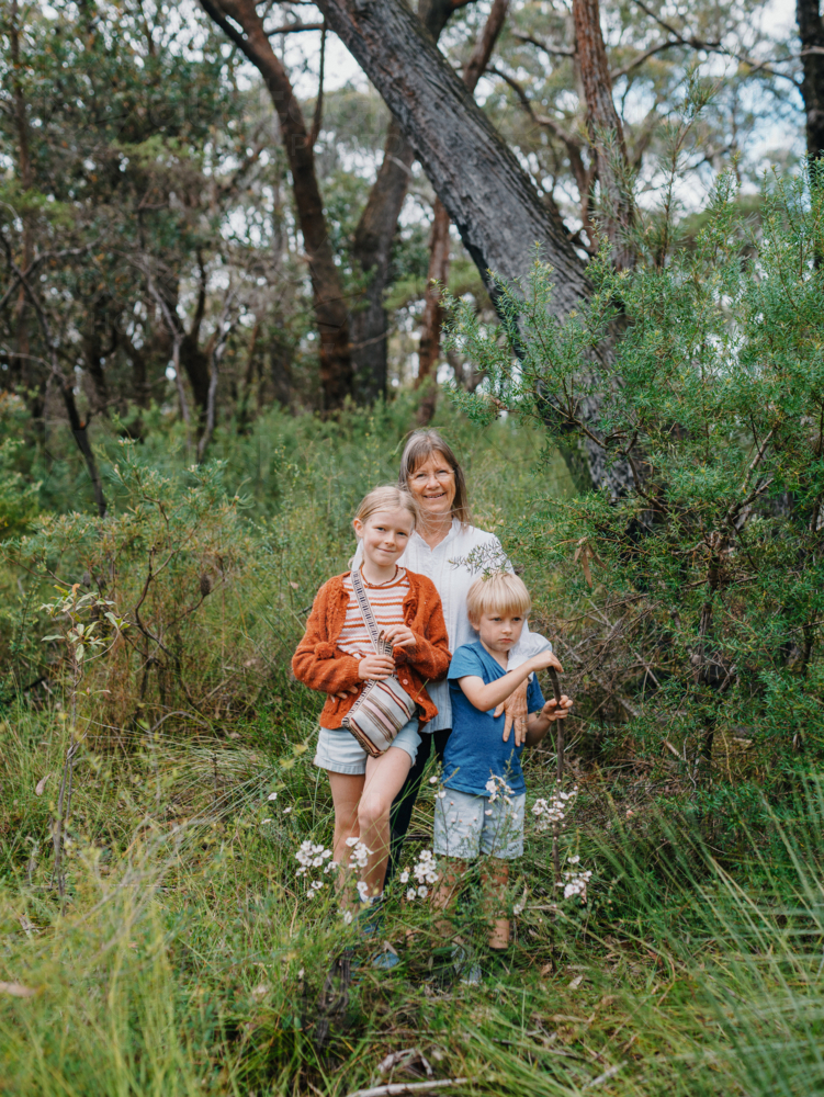 Grandmother enjoying Australian Bushland with her Grandchildren - Australian Stock Image