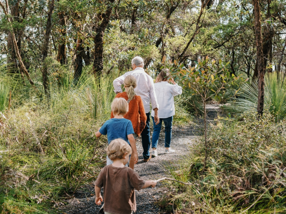 Grandparents enjoying Australian Bushland with their Grandchildren - Australian Stock Image
