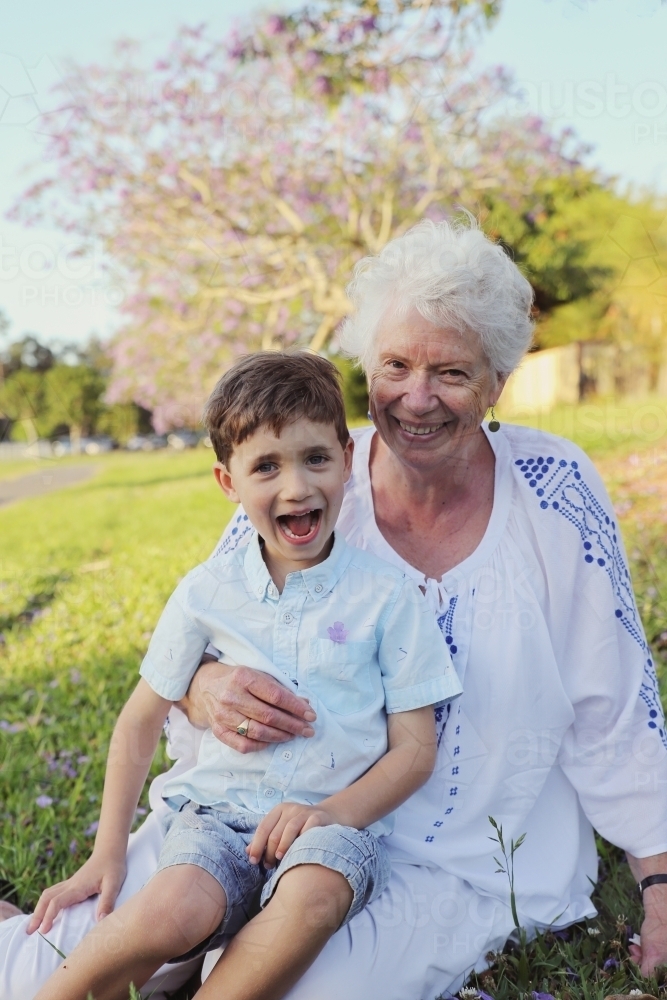 Grandson with grandmother in the park - Australian Stock Image