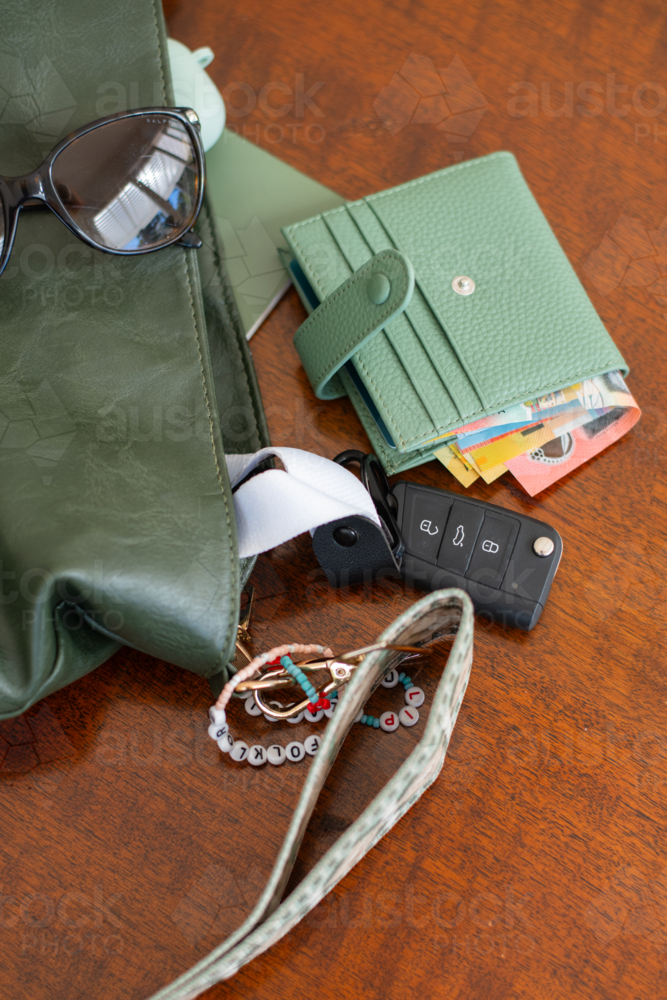 green handbag with Australian money. - Australian Stock Image